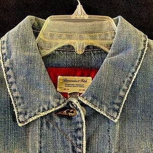 A&F like new distressed Jean jacket, size L. Cute button detailing and pockets